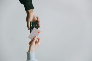 person holding white and black smartphone